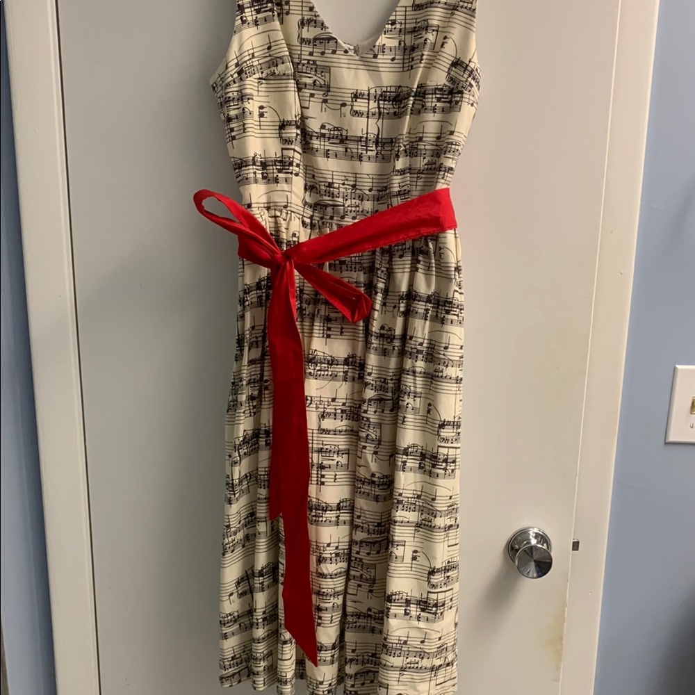 Elegant Music Note Dress with Red Accent